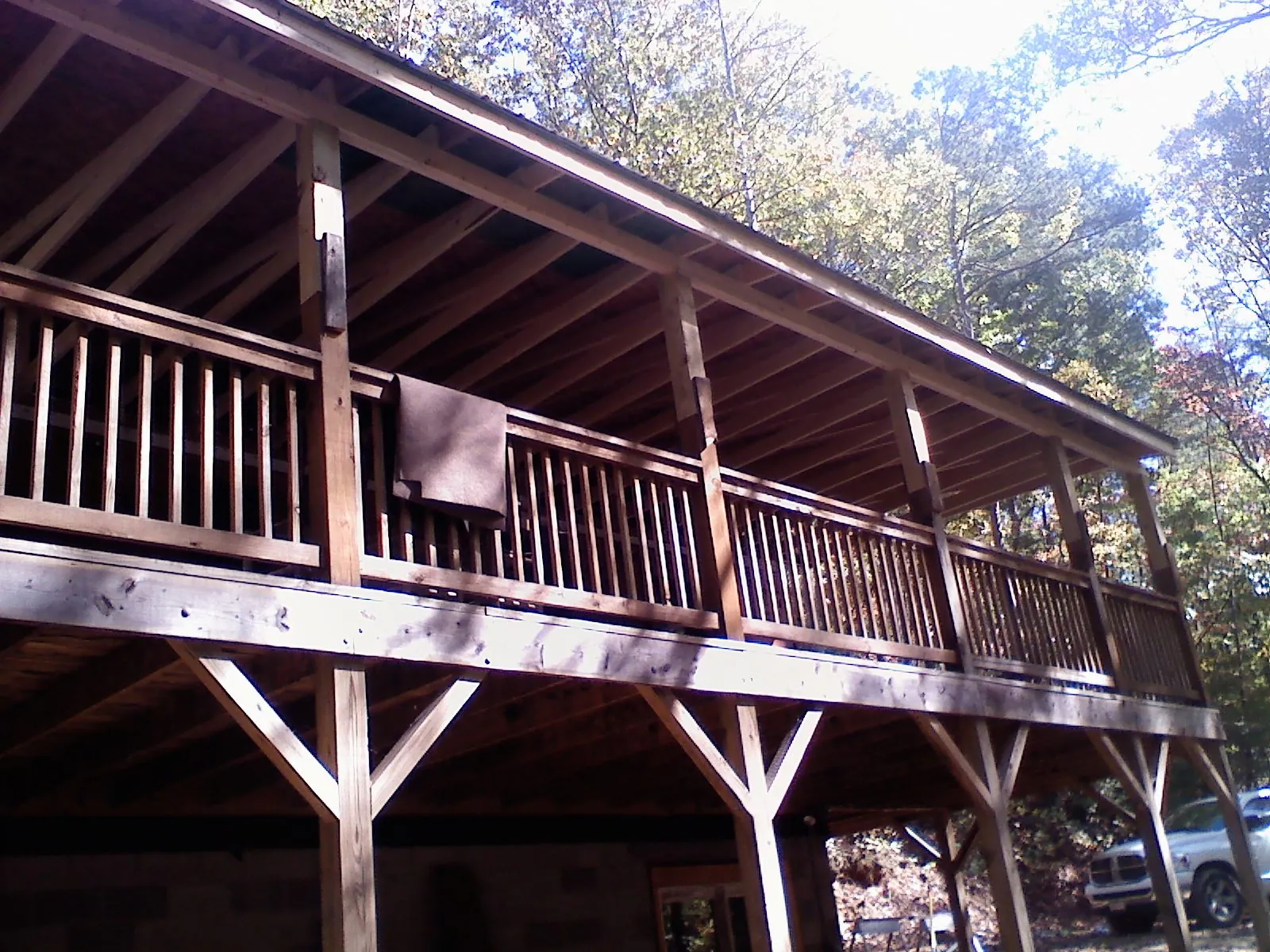 Timber framing under a new elevated porch and deck — Roof Leak Repair in Washington Boro by Roofing Brothers